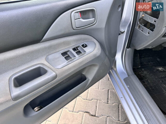Сірий Міцубісі Lancer, об'ємом двигуна 1.3 л та пробігом 450 тис. км за 2850 $, фото 12 на Automoto.ua