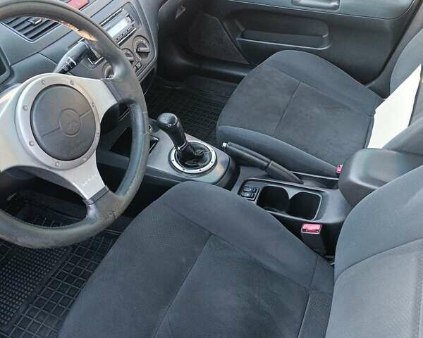Мицубиси Лансер 2004 в Нежине на Automoto.ua Серый Мицубиси Лансер, объемом двигателя 2 л и пробегом 280 тыс. км за 6000 $, фото 4 на Automoto.ua