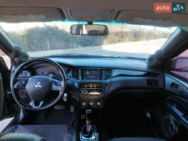 Сірий Міцубісі Lancer, об'ємом двигуна 1.58 л та пробігом 360 тис. км за 4000 $, фото 17 на Automoto.ua