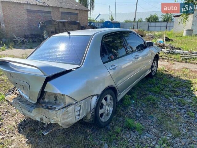 Мицубиси Лансер 2004 в Черкассах на Automoto.ua Серый Мицубиси Лансер, объемом двигателя 1.6 л и пробегом 290 тыс. км за 1600 $, фото 6 на Automoto.ua