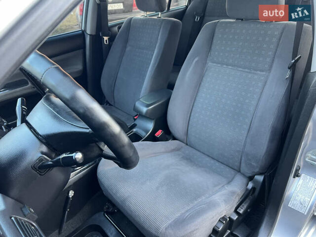 Серый Мицубиси Лансер, объемом двигателя 1.6 л и пробегом 320 тыс. км за 3650 $, фото 30 на Automoto.ua