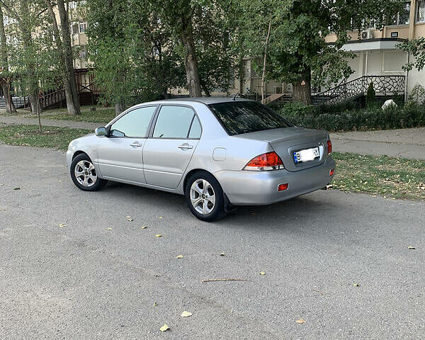 Сірий Міцубісі Lancer, об'ємом двигуна 1.6 л та пробігом 300 тис. км за 4599 $, фото 2 на Automoto.ua