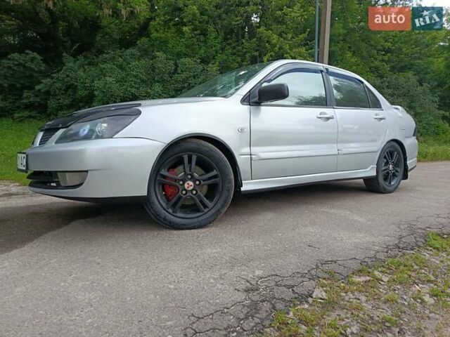 Сірий Міцубісі Lancer, об'ємом двигуна 2 л та пробігом 240 тис. км за 4000 $, фото 4 на Automoto.ua