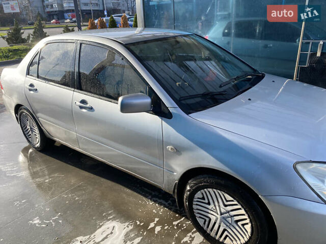 Сірий Міцубісі Lancer, об'ємом двигуна 1.3 л та пробігом 376 тис. км за 3700 $, фото 3 на Automoto.ua