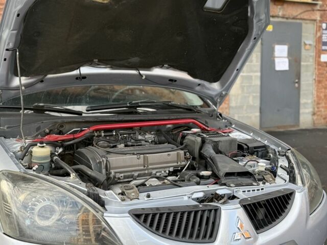 Серый Мицубиси Лансер, объемом двигателя 2 л и пробегом 180 тыс. км за 3700 $, фото 9 на Automoto.ua