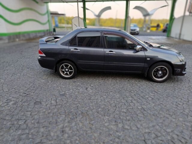 Сірий Міцубісі Lancer, об'ємом двигуна 1.6 л та пробігом 177 тис. км за 4500 $, фото 18 на Automoto.ua