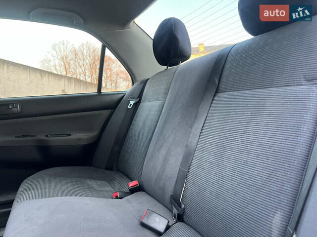 Серый Мицубиси Лансер, объемом двигателя 1.6 л и пробегом 320 тыс. км за 3650 $, фото 39 на Automoto.ua