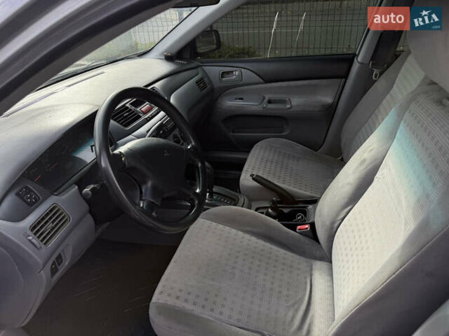 Серый Мицубиси Лансер, объемом двигателя 1.29 л и пробегом 263 тыс. км за 3400 $, фото 6 на Automoto.ua