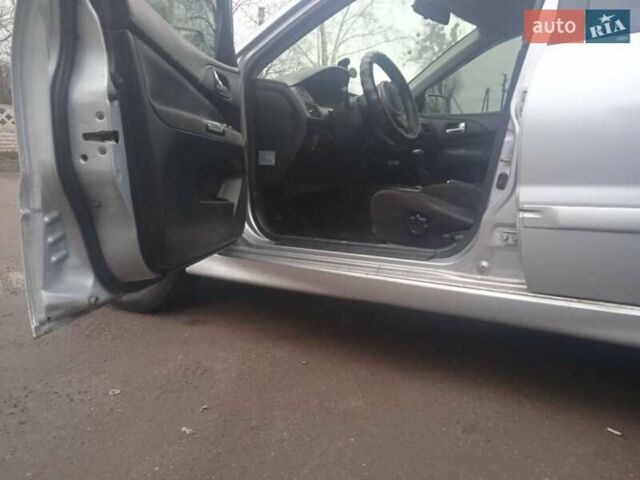 Серый Мицубиси Лансер, объемом двигателя 2 л и пробегом 300 тыс. км за 2850 $, фото 5 на Automoto.ua