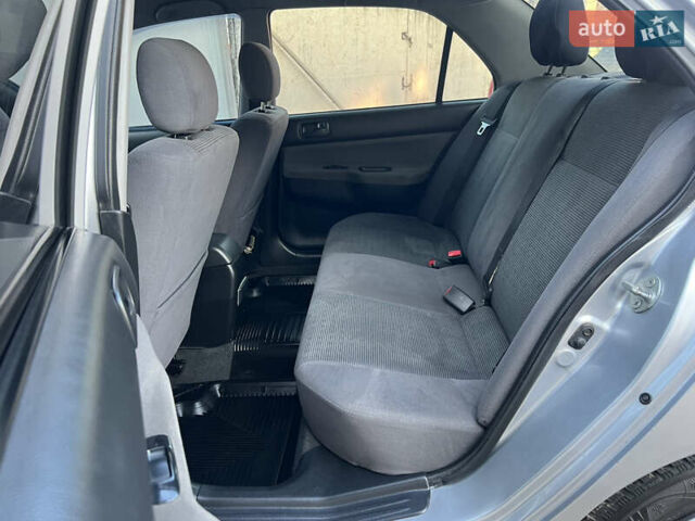 Серый Мицубиси Лансер, объемом двигателя 1.6 л и пробегом 320 тыс. км за 3650 $, фото 38 на Automoto.ua
