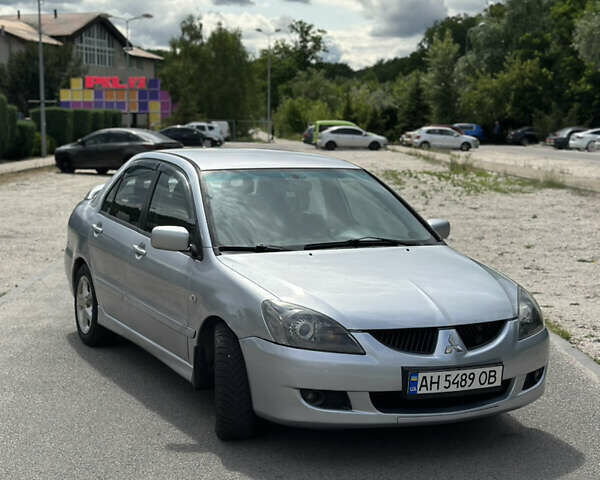 Сірий Міцубісі Lancer, об'ємом двигуна 2 л та пробігом 200 тис. км за 3550 $, фото 5 на Automoto.ua