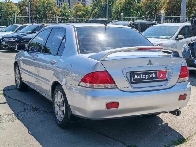 Сірий Міцубісі Lancer, об'ємом двигуна 1.6 л та пробігом 284 тис. км за 4330 $, фото 11 на Automoto.ua
