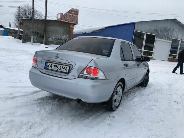 Сірий Міцубісі Lancer, об'ємом двигуна 0.13 л та пробігом 190 тис. км за 4250 $, фото 2 на Automoto.ua