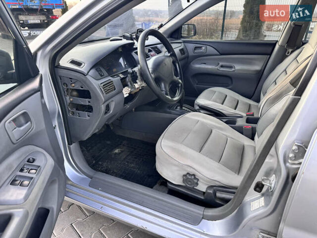 Сірий Міцубісі Lancer, об'ємом двигуна 1.3 л та пробігом 450 тис. км за 2650 $, фото 10 на Automoto.ua