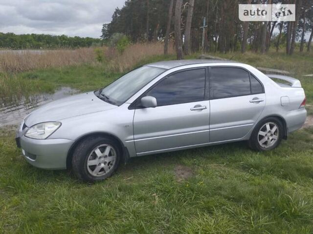 Сірий Міцубісі Lancer, об'ємом двигуна 1.6 л та пробігом 200 тис. км за 4500 $, фото 15 на Automoto.ua