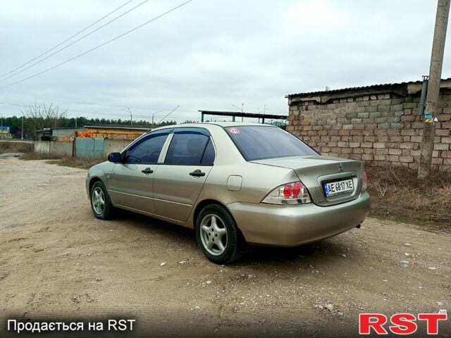Сірий Міцубісі Lancer, об'ємом двигуна 1.3 л та пробігом 223 тис. км за 4300 $, фото 3 на Automoto.ua
