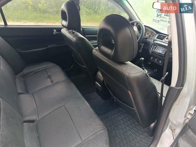Сірий Міцубісі Lancer, об'ємом двигуна 2 л та пробігом 240 тис. км за 4000 $, фото 11 на Automoto.ua