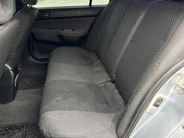 Серый Мицубиси Лансер, объемом двигателя 1.6 л и пробегом 360 тыс. км за 2400 $, фото 6 на Automoto.ua