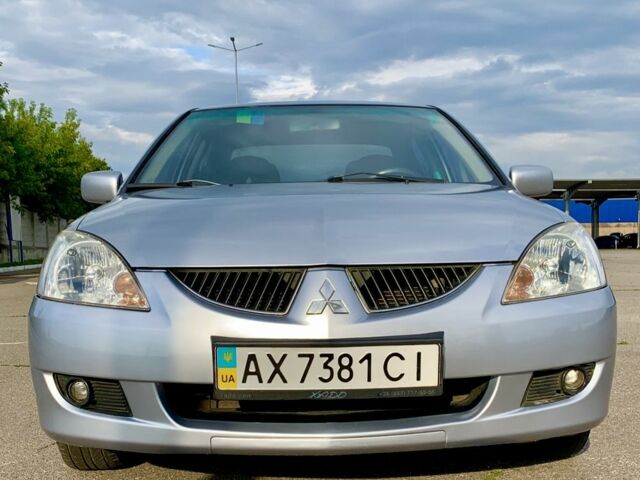 Сірий Міцубісі Lancer, об'ємом двигуна 1.6 л та пробігом 285 тис. км за 4450 $, фото 3 на Automoto.ua