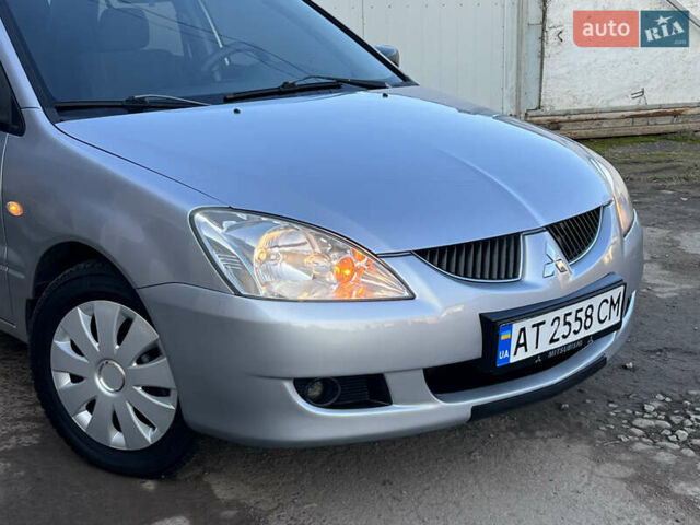 Серый Мицубиси Лансер, объемом двигателя 1.6 л и пробегом 320 тыс. км за 3650 $, фото 7 на Automoto.ua