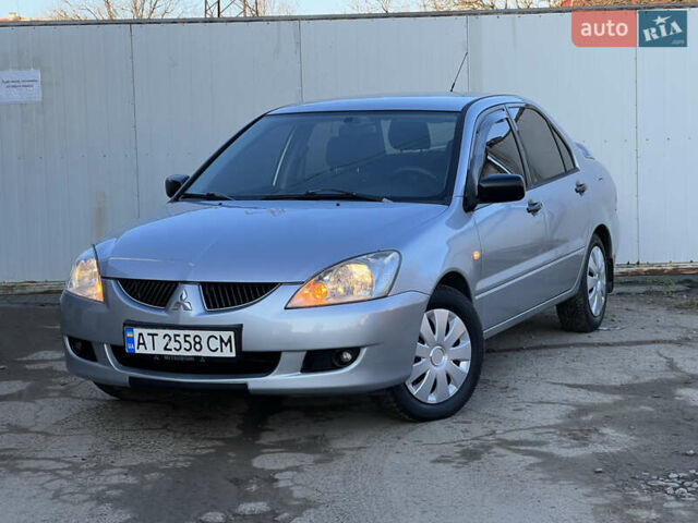 Серый Мицубиси Лансер, объемом двигателя 1.6 л и пробегом 320 тыс. км за 3650 $, фото 11 на Automoto.ua