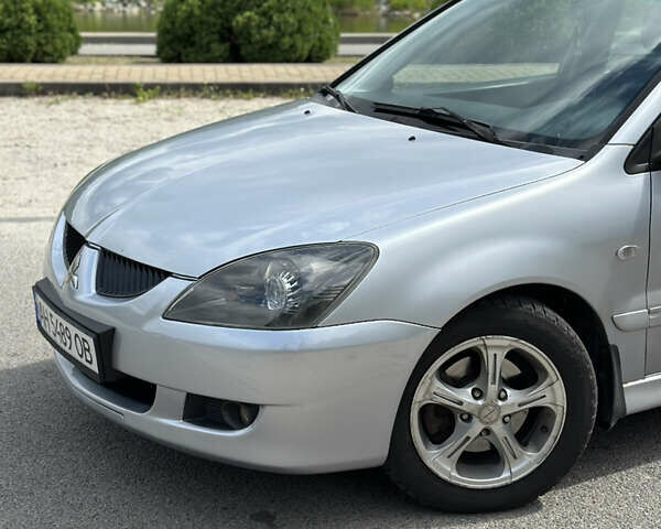 Сірий Міцубісі Lancer, об'ємом двигуна 2 л та пробігом 200 тис. км за 3550 $, фото 7 на Automoto.ua