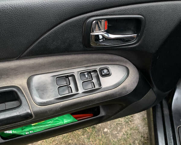 Сірий Міцубісі Lancer, об'ємом двигуна 2 л та пробігом 297 тис. км за 2900 $, фото 8 на Automoto.ua