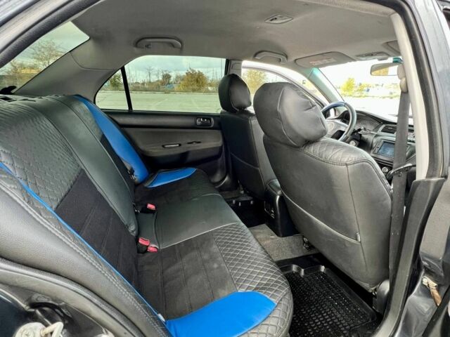 Серый Мицубиси Лансер, объемом двигателя 1.6 л и пробегом 490 тыс. км за 1799 $, фото 13 на Automoto.ua