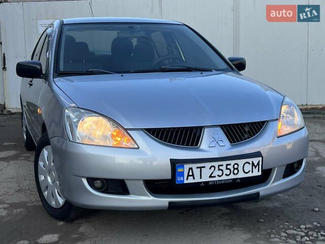 Серый Мицубиси Лансер, объемом двигателя 1.6 л и пробегом 320 тыс. км за 3650 $, фото 8 на Automoto.ua
