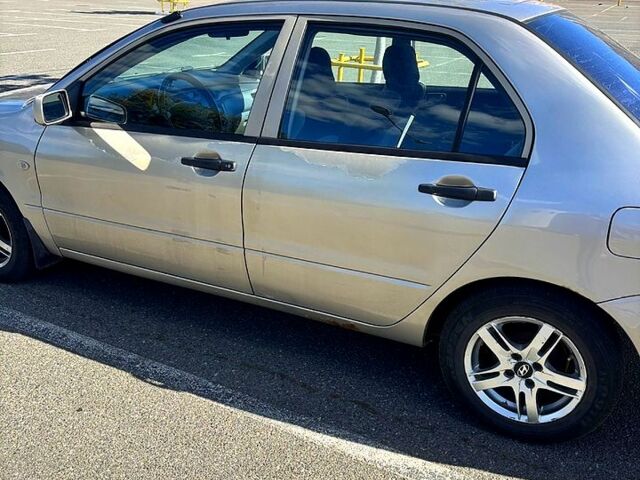 Серый Мицубиси Лансер, объемом двигателя 1.3 л и пробегом 245 тыс. км за 3000 $, фото 7 на Automoto.ua