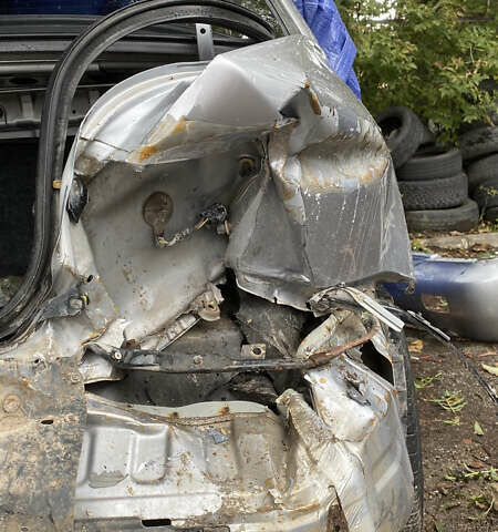 Сірий Міцубісі Lancer, об'ємом двигуна 1.58 л та пробігом 270 тис. км за 1999 $, фото 21 на Automoto.ua