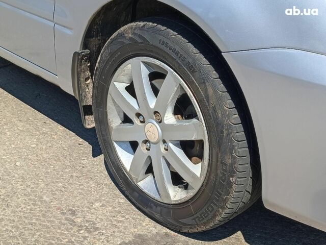 Мицубиси Лансер 2004 в Харькове на Automoto.ua Серый Мицубиси Лансер, объемом двигателя 1.6 л и пробегом 284 тыс. км за 4990 $, фото 5 на Automoto.ua