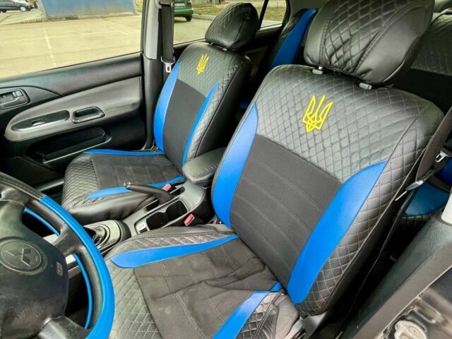 Серый Мицубиси Лансер, объемом двигателя 1.6 л и пробегом 490 тыс. км за 1799 $, фото 9 на Automoto.ua