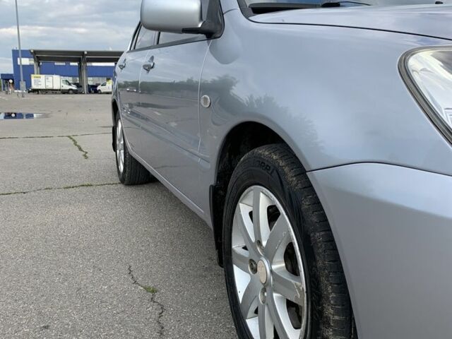 Сірий Міцубісі Lancer, об'ємом двигуна 1.6 л та пробігом 285 тис. км за 4450 $, фото 1 на Automoto.ua