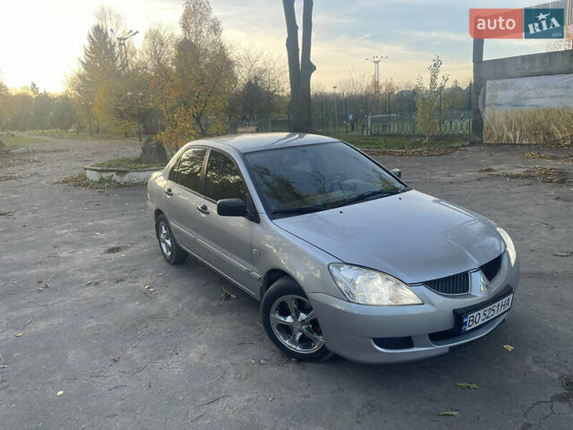 Сірий Міцубісі Lancer, об'ємом двигуна 1.58 л та пробігом 271 тис. км за 3000 $, фото 1 на Automoto.ua