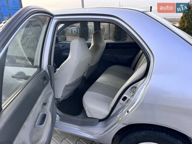 Сірий Міцубісі Lancer, об'ємом двигуна 1.3 л та пробігом 450 тис. км за 2650 $, фото 15 на Automoto.ua