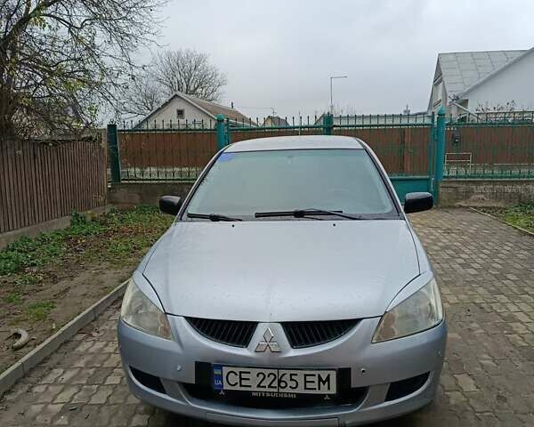 Сірий Міцубісі Lancer, об'ємом двигуна 1.58 л та пробігом 439 тис. км за 2500 $, фото 3 на Automoto.ua