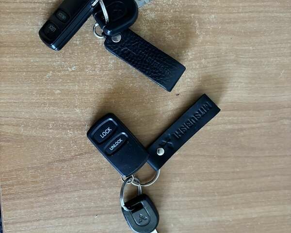 Сірий Міцубісі Lancer, об'ємом двигуна 1.58 л та пробігом 167 тис. км за 5100 $, фото 43 на Automoto.ua