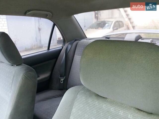 Сірий Міцубісі Lancer, об'ємом двигуна 1.58 л та пробігом 531 тис. км за 2828 $, фото 14 на Automoto.ua