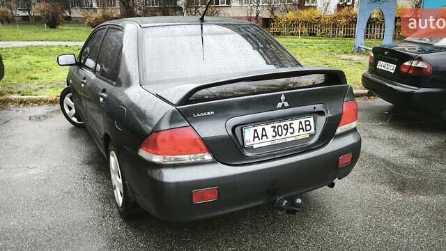 Сірий Міцубісі Lancer, об'ємом двигуна 1.58 л та пробігом 110 тис. км за 2999 $, фото 9 на Automoto.ua