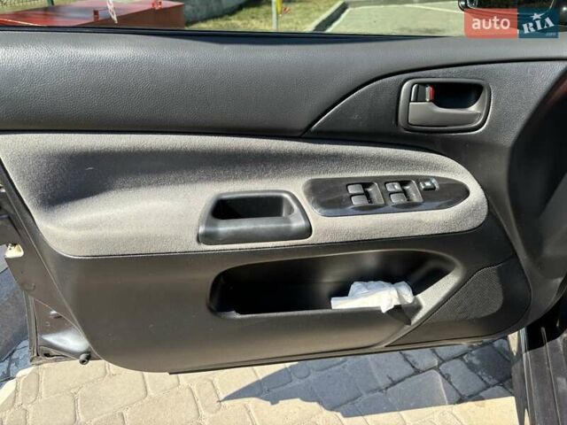 Сірий Міцубісі Lancer, об'ємом двигуна 1.58 л та пробігом 167 тис. км за 5100 $, фото 27 на Automoto.ua