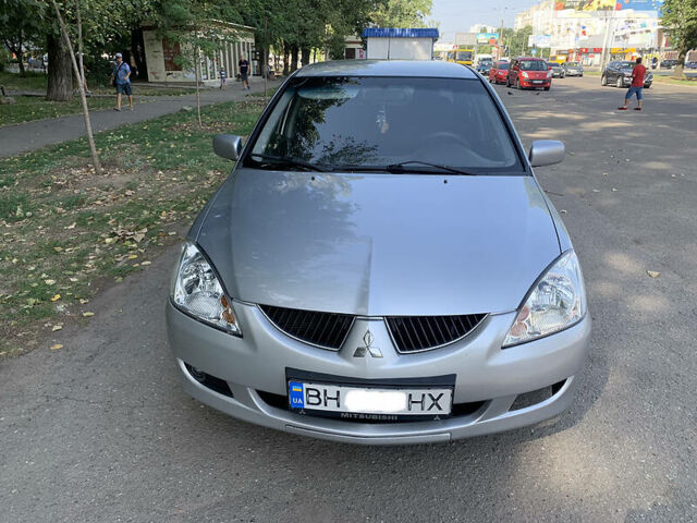 Сірий Міцубісі Lancer, об'ємом двигуна 1.6 л та пробігом 300 тис. км за 4599 $, фото 10 на Automoto.ua