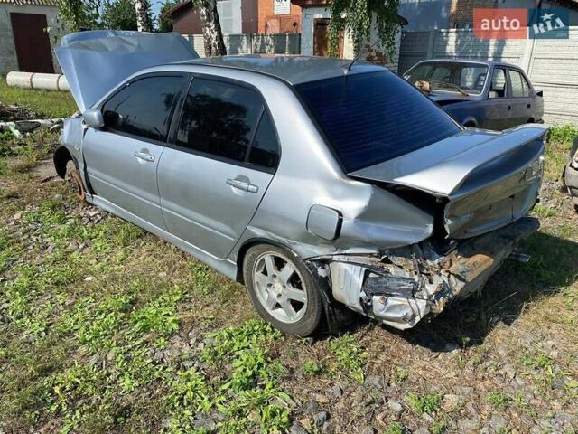 Мицубиси Лансер 2004 в Черкассах на Automoto.ua Серый Мицубиси Лансер, объемом двигателя 1.6 л и пробегом 290 тыс. км за 1600 $, фото 9 на Automoto.ua