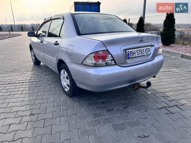 Сірий Міцубісі Lancer, об'ємом двигуна 1.3 л та пробігом 450 тис. км за 2650 $, фото 4 на Automoto.ua