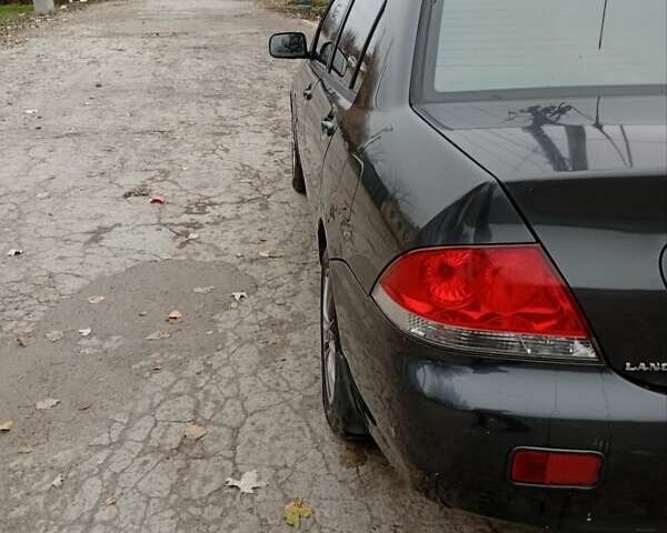 Серый Мицубиси Лансер, объемом двигателя 1.6 л и пробегом 372 тыс. км за 3500 $, фото 2 на Automoto.ua