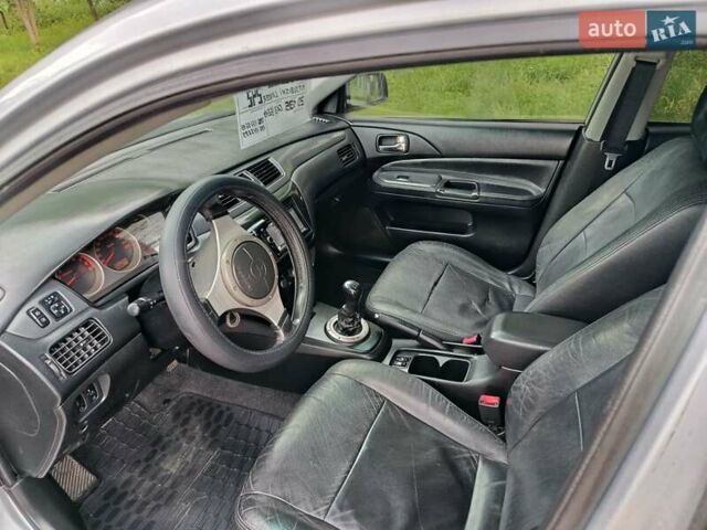 Сірий Міцубісі Lancer, об'ємом двигуна 2 л та пробігом 240 тис. км за 4000 $, фото 12 на Automoto.ua