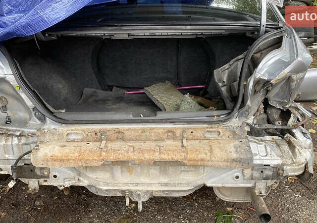 Сірий Міцубісі Lancer, об'ємом двигуна 1.58 л та пробігом 270 тис. км за 1999 $, фото 20 на Automoto.ua