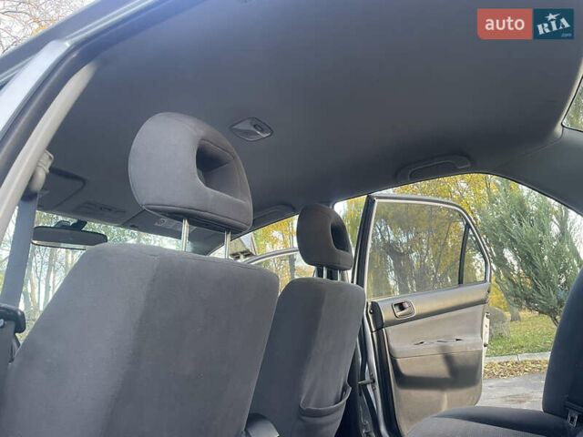 Мицубиси Лансер 2004 в Теофиполь на Automoto.ua Серый Мицубиси Лансер, объемом двигателя 1.58 л и пробегом 270 тыс. км за 3350 $, фото 22 на Automoto.ua