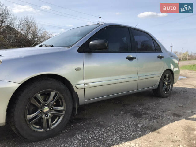 Мицубиси Лансер 2004 в Днепре (Днепропетровске) на Automoto.ua Серый Мицубиси Лансер, объемом двигателя 1.59 л и пробегом 294 тыс. км за 4699 $, фото 2 на Automoto.ua