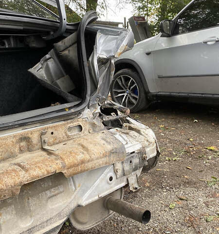 Сірий Міцубісі Lancer, об'ємом двигуна 1.58 л та пробігом 270 тис. км за 1999 $, фото 19 на Automoto.ua